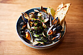 Steamed mussels served with crusty bread