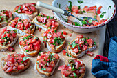 Bruschetta with tomatoes, basil and capers