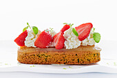 Strawberry-and-basil sable on a light surface