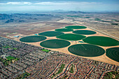 Farms and urban housing, aerial photograph