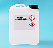 Mineral fertilizers in a plastic canister, conceptual image