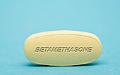 Betamethasone pill, conceptual image