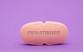 Finasteride pill, conceptual image