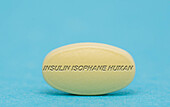 Insulin isophane human pill, conceptual image