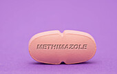 Methimazole pill, conceptual image