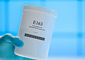 Container of the food additive E163