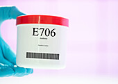 Container of the food additive E706