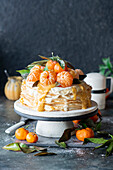 Tangerine crêpe cake with tangerine curd and vanilla cream