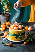 Tangerine profiterole cake with Japanese sponge and tangerine curd