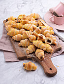 Vegan mini croissants made from yeast dough, filled with nut nougat