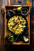 Cheese spaetzle with fried onions and pear salad