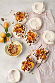 Pavlovas with apricots and espresso caramel