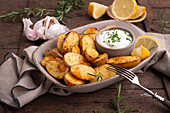 Baked rosemary potatoes with vegan sour cream