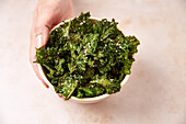Kale chips with black cumin and sesame seeds