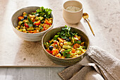 Millet salad with cucumber, tomatoes, chickpeas and blueberries