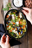 Fish stew with mussels, potatoes and savoy cabbage