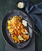Baked fish fillets with fried potatoes and wasabi crème fraîche