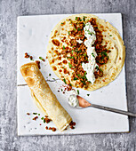 Pancakes with minced meat and feta cheese cream