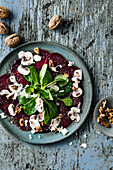 Carpaccio of beetroot and mushrooms with lamb's lettuce and walnuts