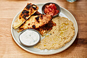 Hummus with flame-grilled pita bread