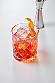 A Negroni with orange zest