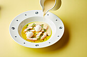 White fish with quail's eggs and a light sauce