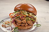 Pork burger with coleslaw