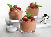 Chocolate Mousse with candies cherries