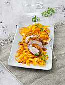 Veal fillet with pumpkin crust and pumpkin zoodles
