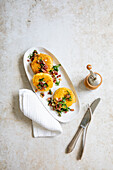 Potato tartlets in egg shell with bacon dip