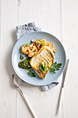 Pike perch fillet with tarragon pesto and cauliflower