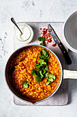 Curried red lentil soup with natural yogurt