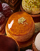 Glazed biscuits with gold leaf