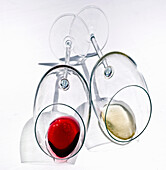 Red wine glass and white wine glass with wine residue