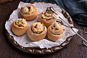 Vegan yeast buns filled with almond cheese, walnuts and vegan bacon