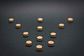Pills in an arrow shape, conceptual image