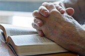Close-up of praying hands
