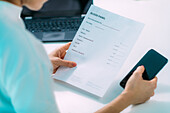 Woman looking at a blood panel form