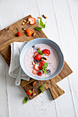 Cold strawberry mint soup with poppy seeds