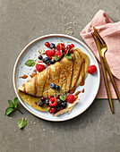 Sweet berry crepe with nut puree