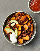 Loaded crunchy sweet crisps with kidney beans and soy crumbles