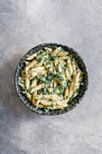 Spinach penne with cashew cream sauce