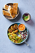 Falafel bowl with pointed cabbage salad and feta crumble