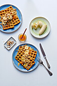 Breakfast waffles with granola and almonds
