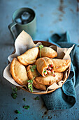 Mini calzone with onion and cheese filling