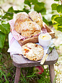 Soda bread rolls with sun-dried tomatoes, served with salty butter