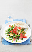 Watermelon and bean salad with mint and halloumi