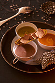 Cream of vegetable soup served with tartine and foie gras (Christmas)
