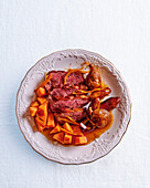 Duck breast with orange, dates, figs, and pumpkin