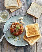 Vegan steak tartare with toast